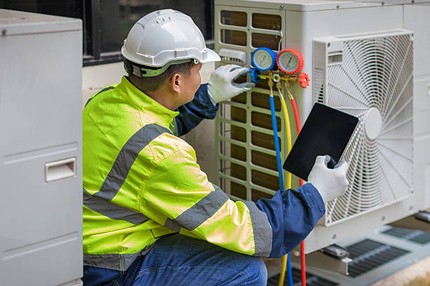 Professional Heat Pump Repair technician working in Clayton, IN